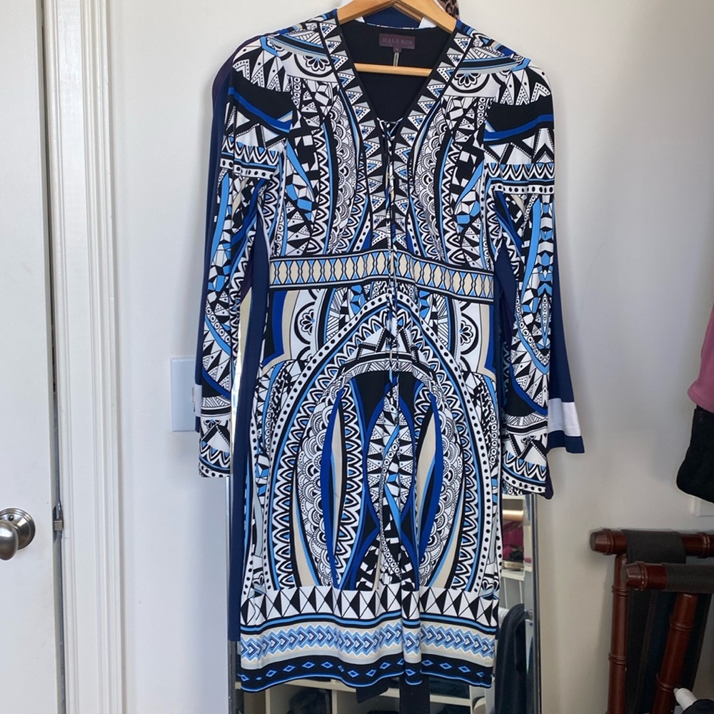 Lined dress, with partial lace/tie up at the chest area.